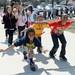 Carpenter Elementary school fourth graders Lyle Parsons, Ethan McConville and Kameron Newman flap their arms like birds as they march around the school for a 175th birthday celebration on Friday, April 26, 2013. Melanie Maxwell I AnnArbor.com